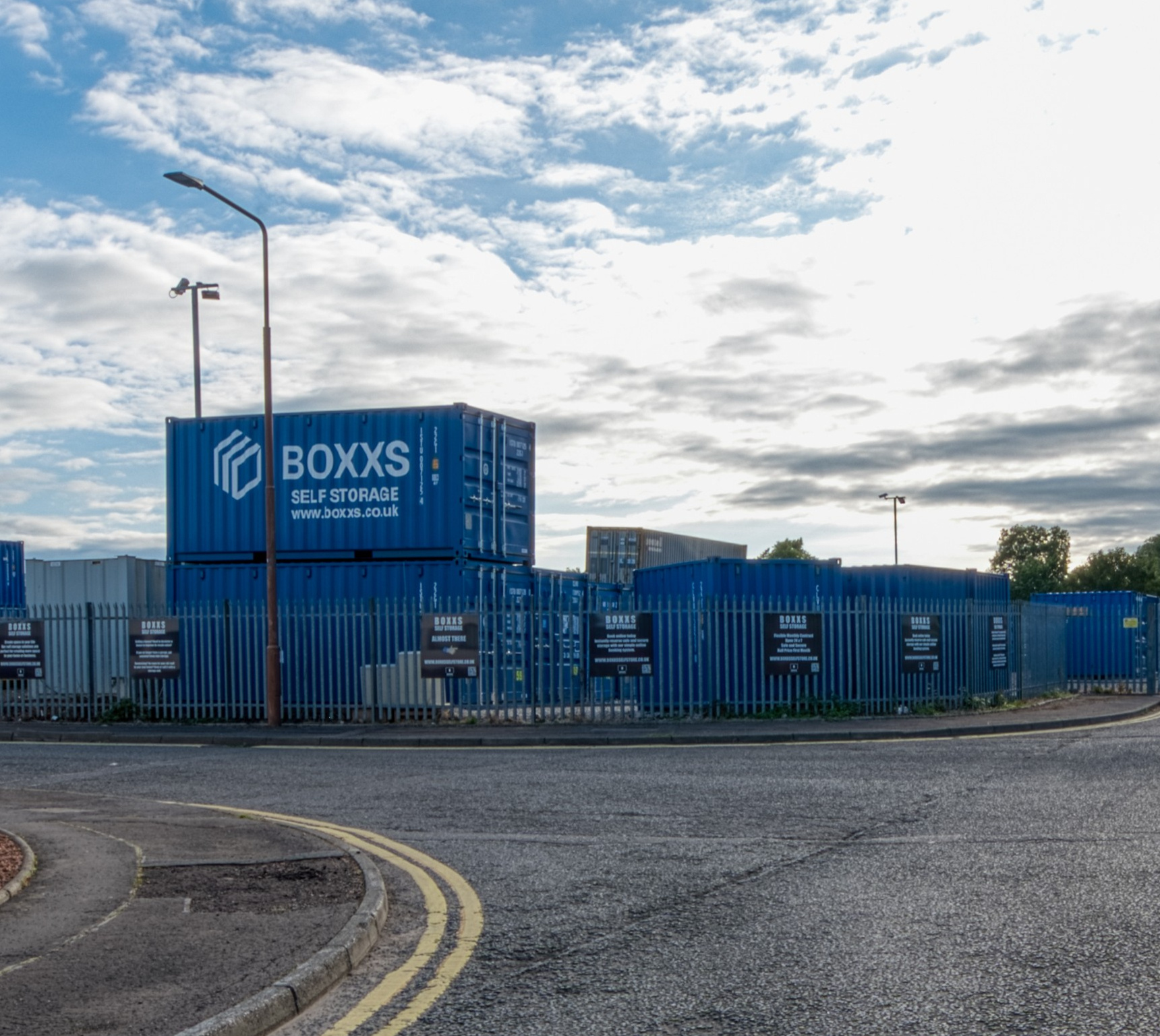 Boxxs self storage container with painted logo at the entrance to Boxxs Self Storage in Linlithgow, welcoming Bo’ness and West Lothian customers